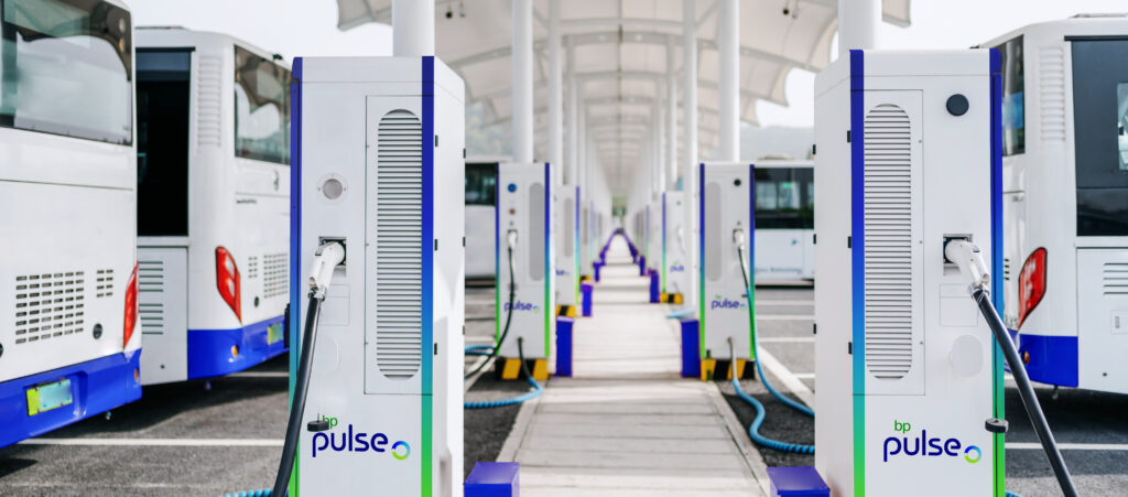 electric vehicle chargers in a line with bp pulse branding